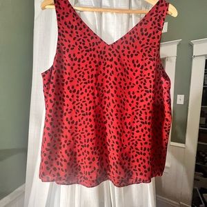 Red and black patterned blouse